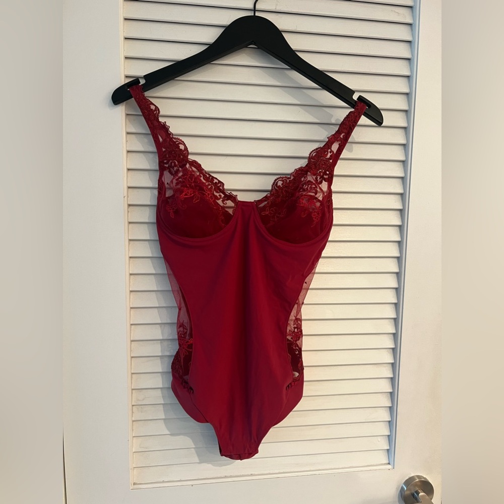 Bodysuit EXILIA .New without tags.Made in Italy